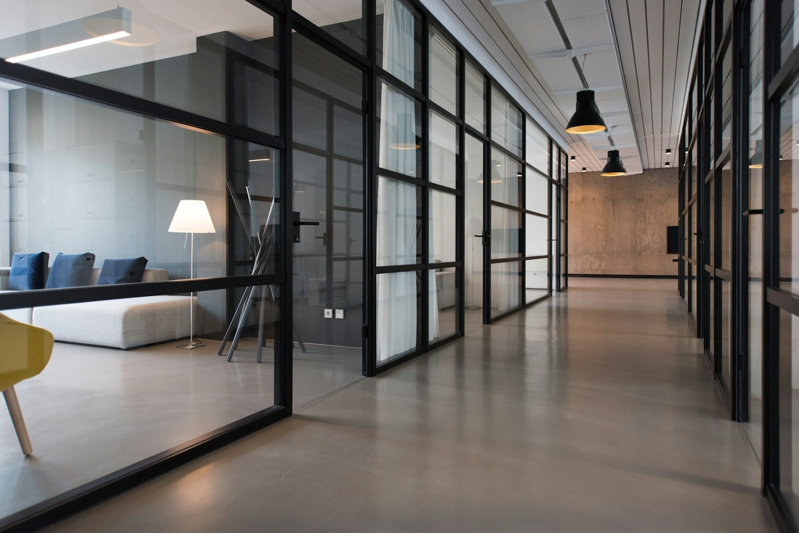 Modern studio workspace with desks and natural light.